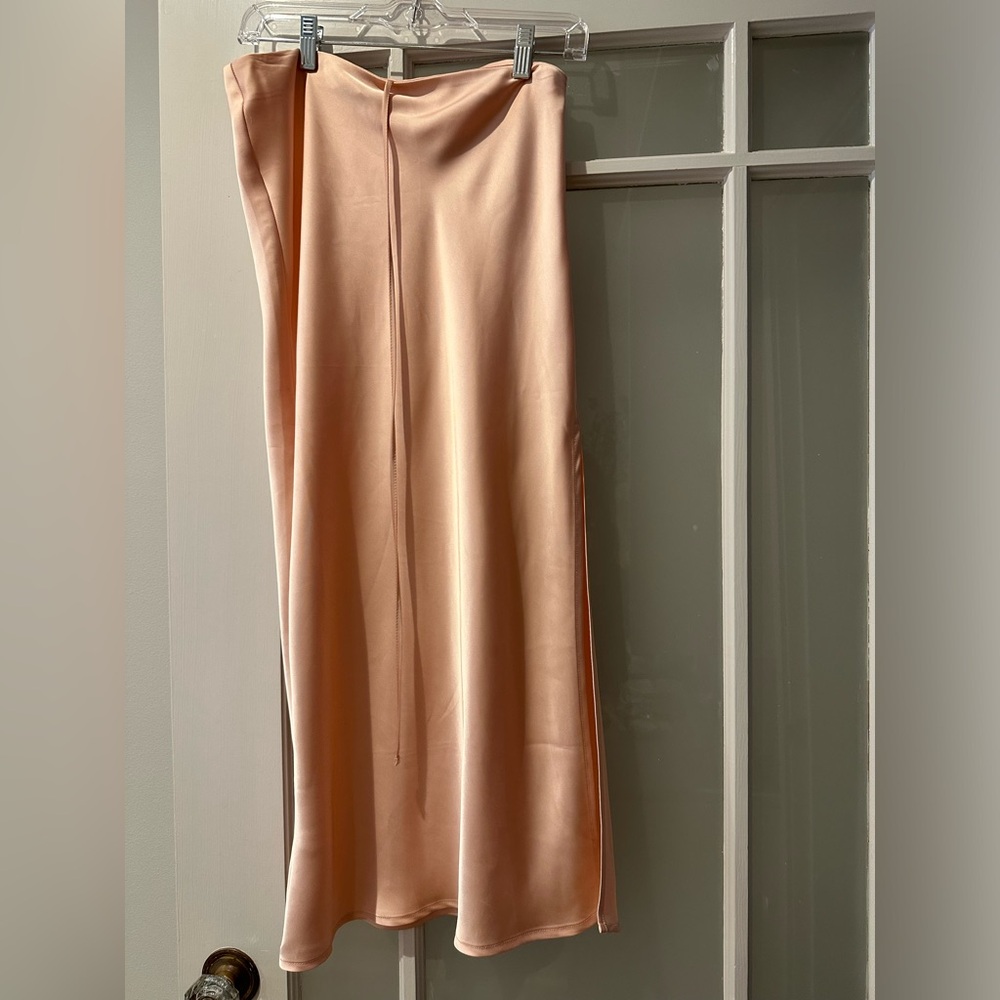 Satin pink midi skirt with tie waist and slit